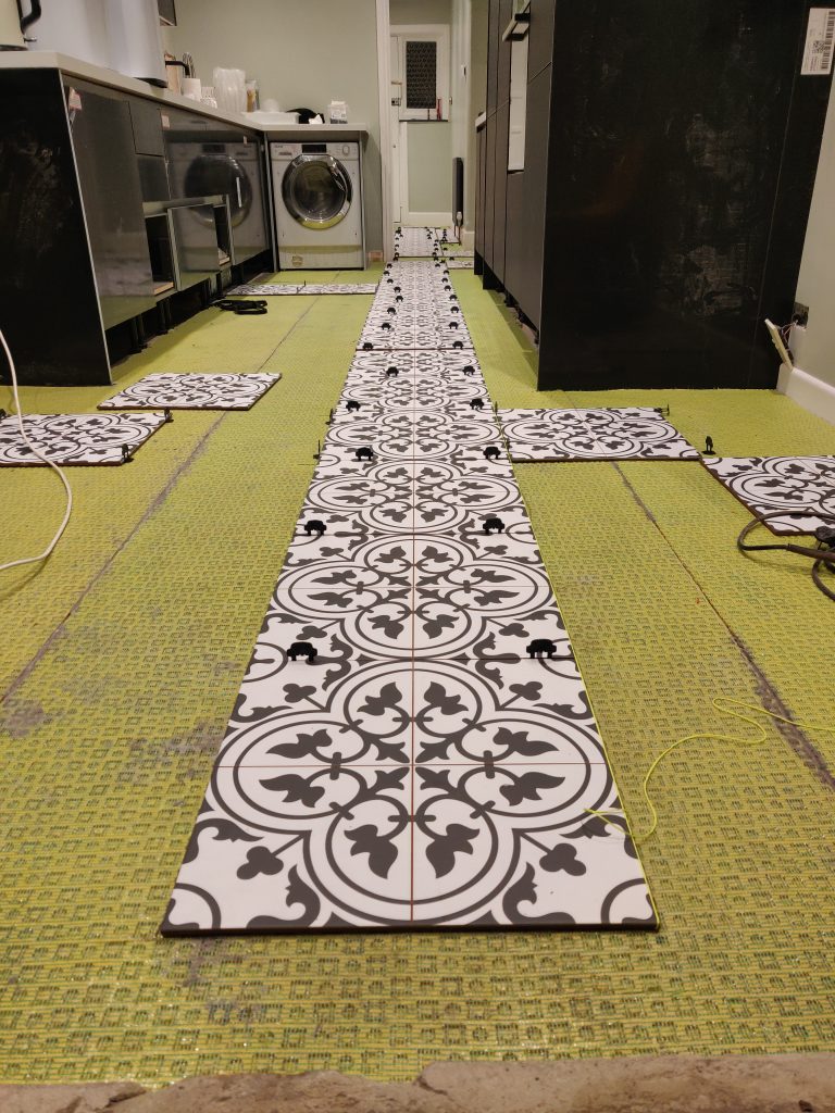 Matting on floor before tiles